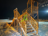 Зимняя горка "IgraGrad Snow Fox 12 м" с двумя скатами и выкатом 8 м